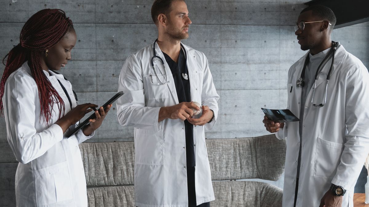 Hospital clinical leaders in a strategic discussion during an integration